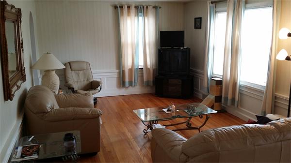 40 Wrona Street Springfield, MA 01151 - Photo 4 of 6 a living room with furniture and a window