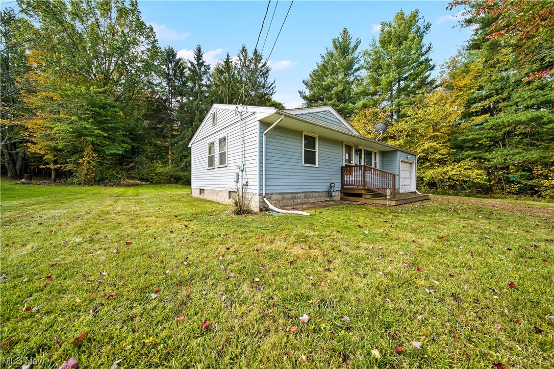 1168 Garrison Road Ashtabula, OH 44004 - Photo 2 of 35 Back of property featuring a yard
