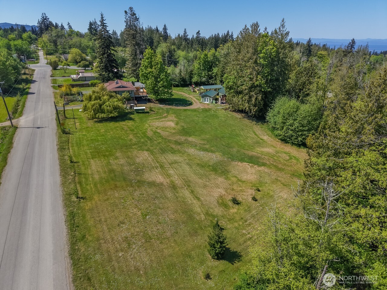 63 East Arnette Road Port Angeles, WA 98362 - Photo 8 of 40 a view of a yard