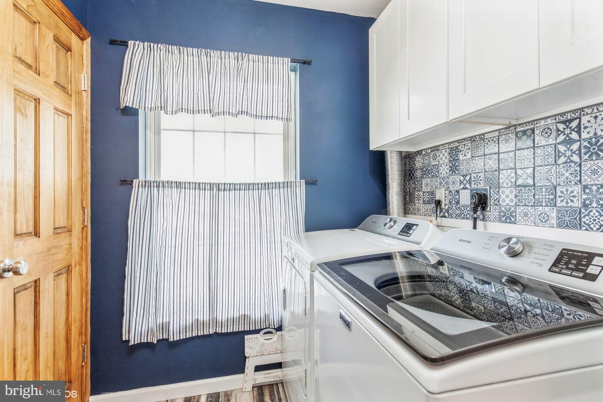 2425 Golupski Road Essex, MD 21221 - Photo 17 of 48 a kitchen with a stove a sink and a window