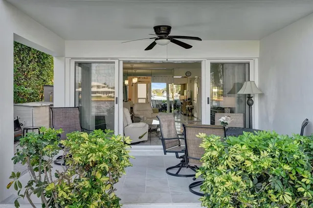 a view of a patio with garden