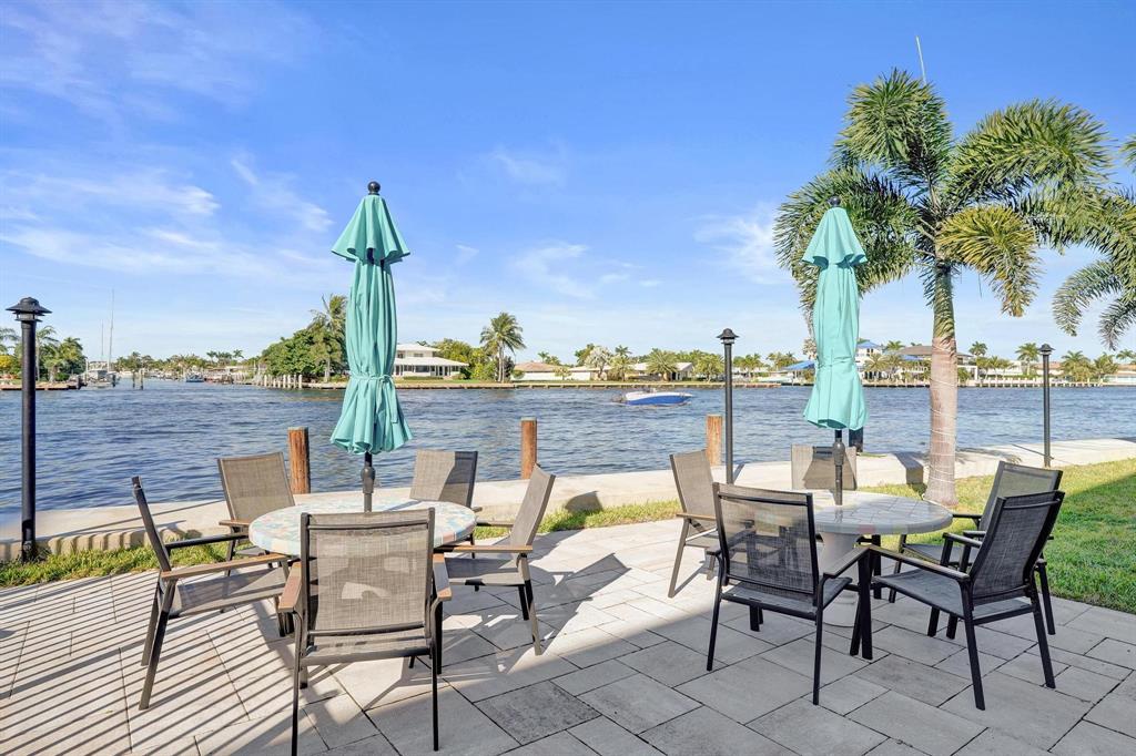 505 North Riverside Drive, Unit 7 Pompano Beach, FL 33062 - Photo 24 of 43 a view of a terrace with furniture