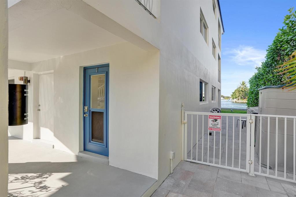 505 North Riverside Drive, Unit 7 Pompano Beach, FL 33062 - Photo 28 of 43 a view of a house with a hallway