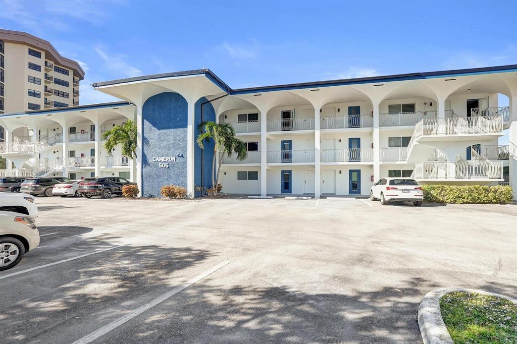 505 North Riverside Drive, Unit 7 Pompano Beach, FL 33062 - Photo 30 of 43 a view of a building with a street