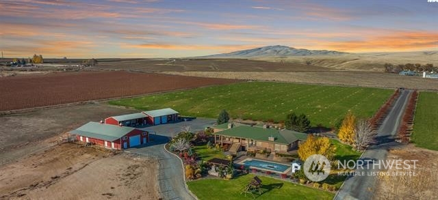 23133 West Orcutt Road Benton City, WA 99320 - Photo 1 of 1 a view of a lake with couches and city view