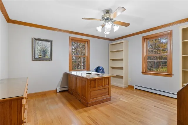 a bed room with a bed and a window