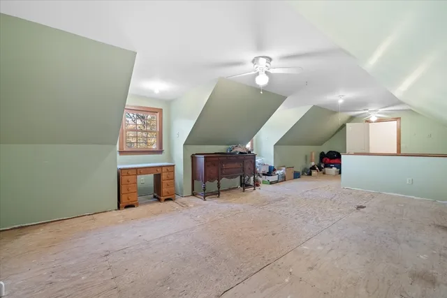 en view interior of a house with a fireplace and window