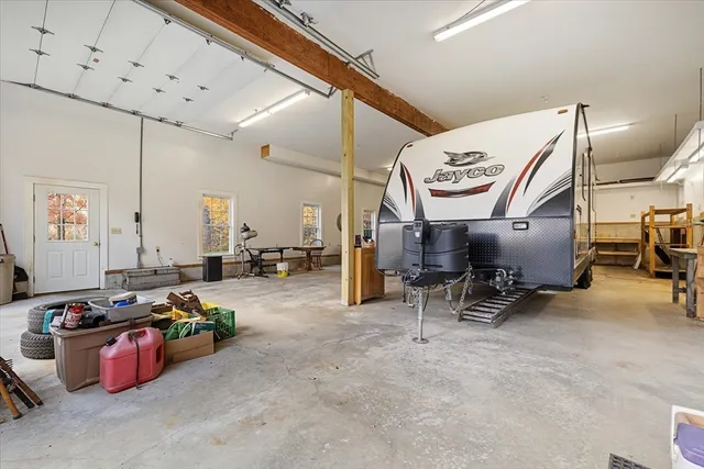 a room with gym equipment and a large window