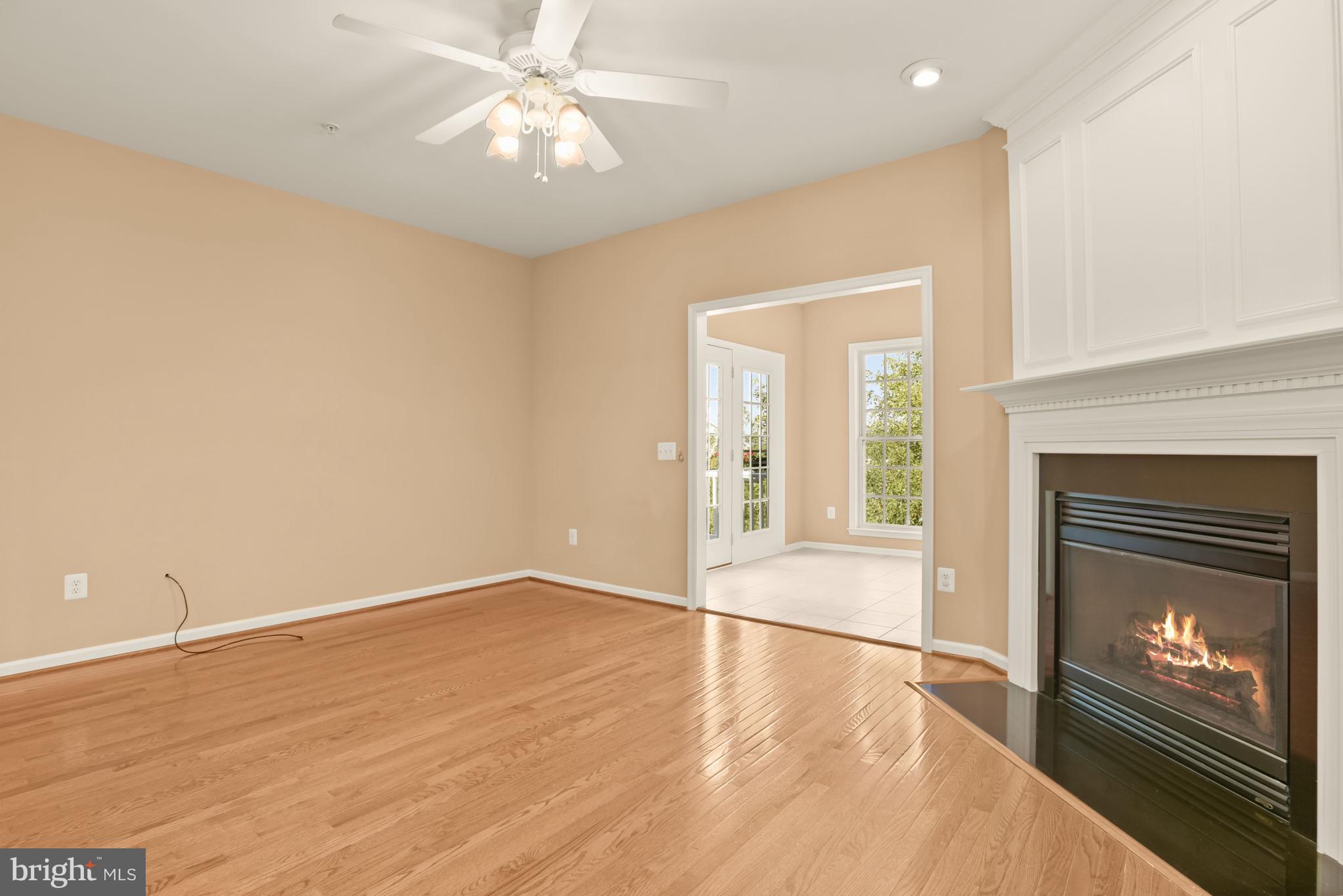 8266 Academy Road, Unit 2 Ellicott City, MD 21043 - Photo 15 of 58 Gas fireplace & hardwood flooring