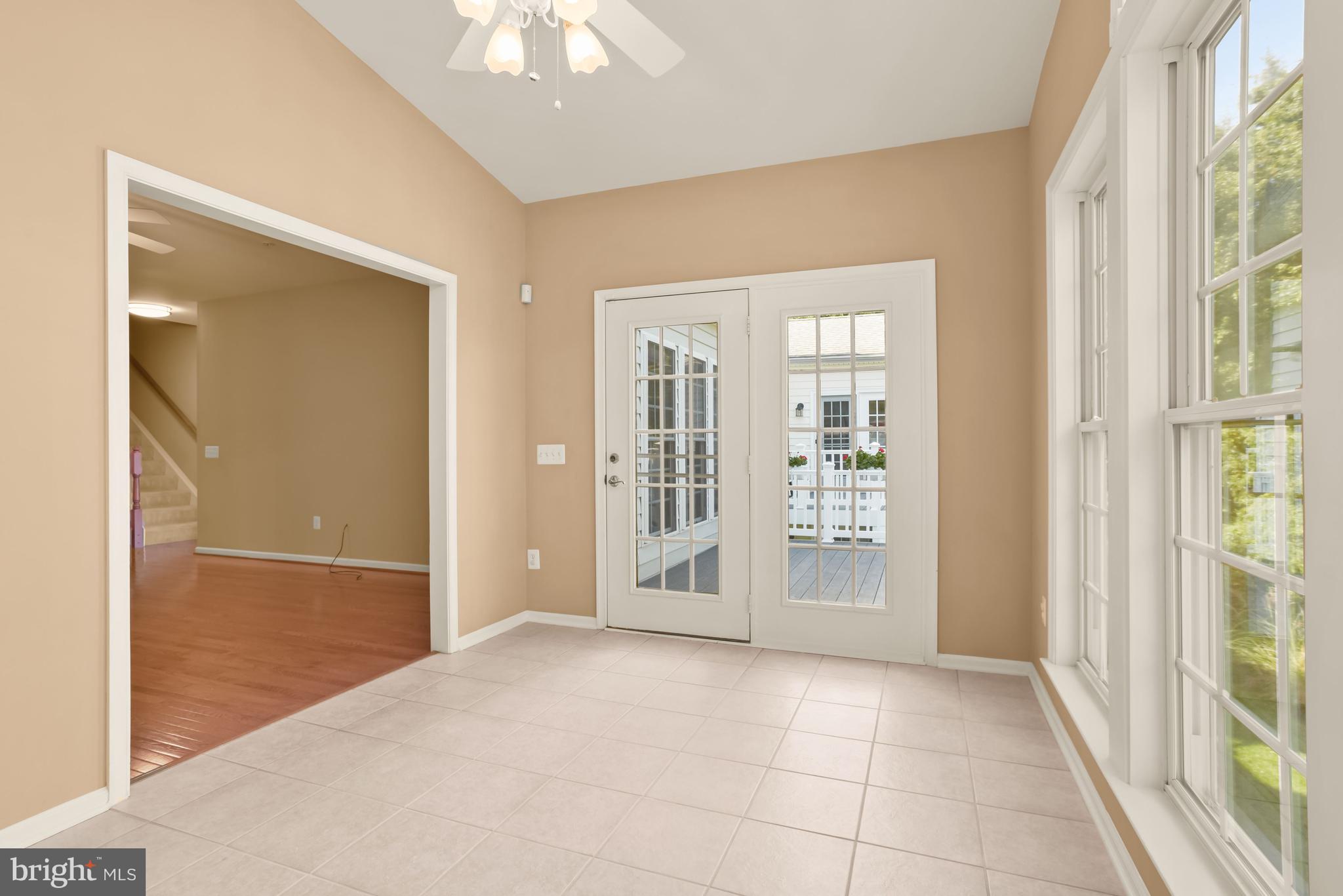 8266 Academy Road, Unit 2 Ellicott City, MD 21043 - Photo 17 of 58 Sunroom with deck access