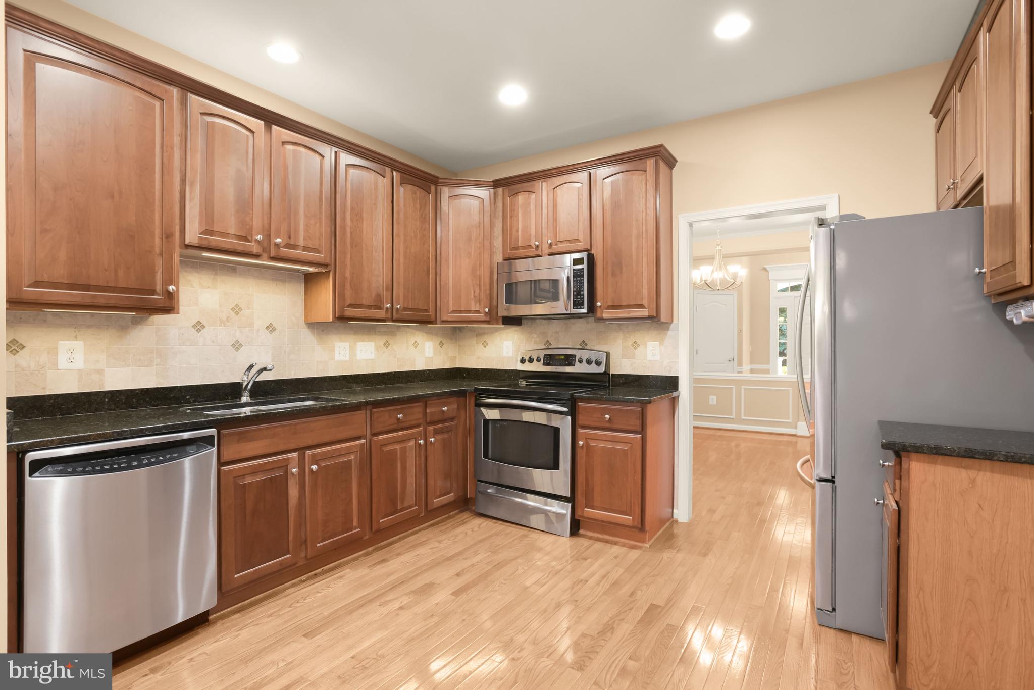 8266 Academy Road, Unit 2 Ellicott City, MD 21043 - Photo 2 of 58 Granite kitchen with breakfast nook