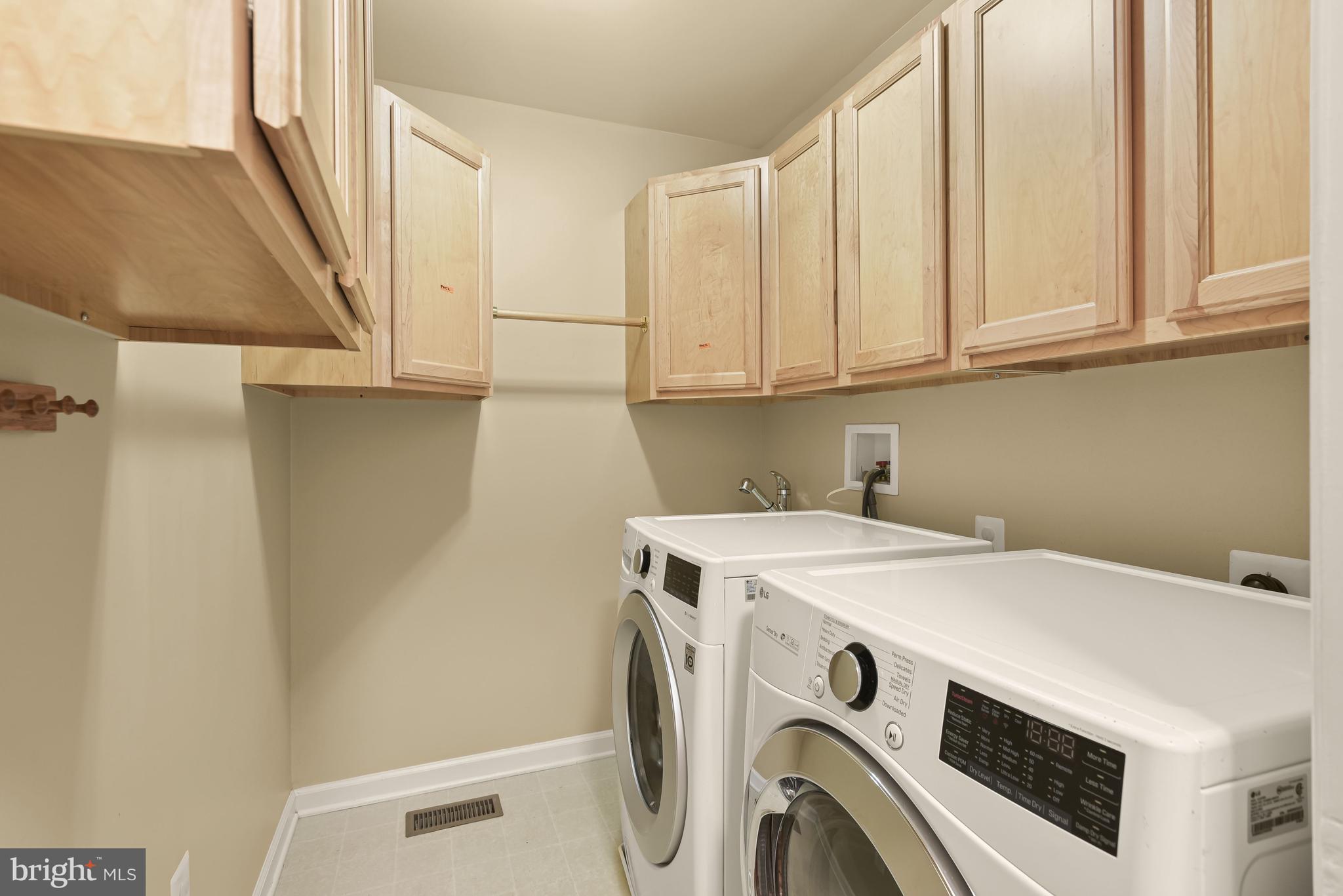 8266 Academy Road, Unit 2 Ellicott City, MD 21043 - Photo 25 of 58 Entry level laundry room