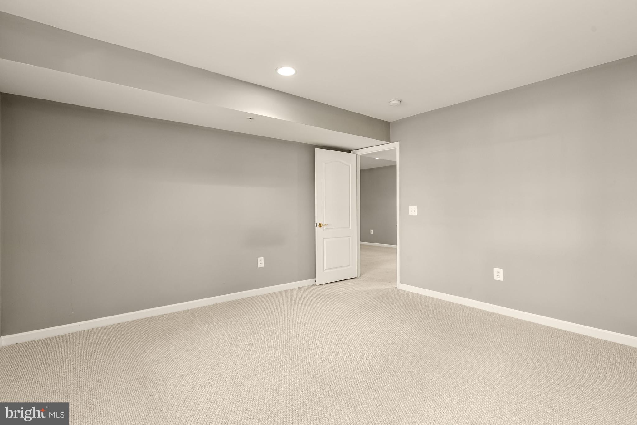 8266 Academy Road, Unit 2 Ellicott City, MD 21043 - Photo 42 of 58 Lower level bedroom 4