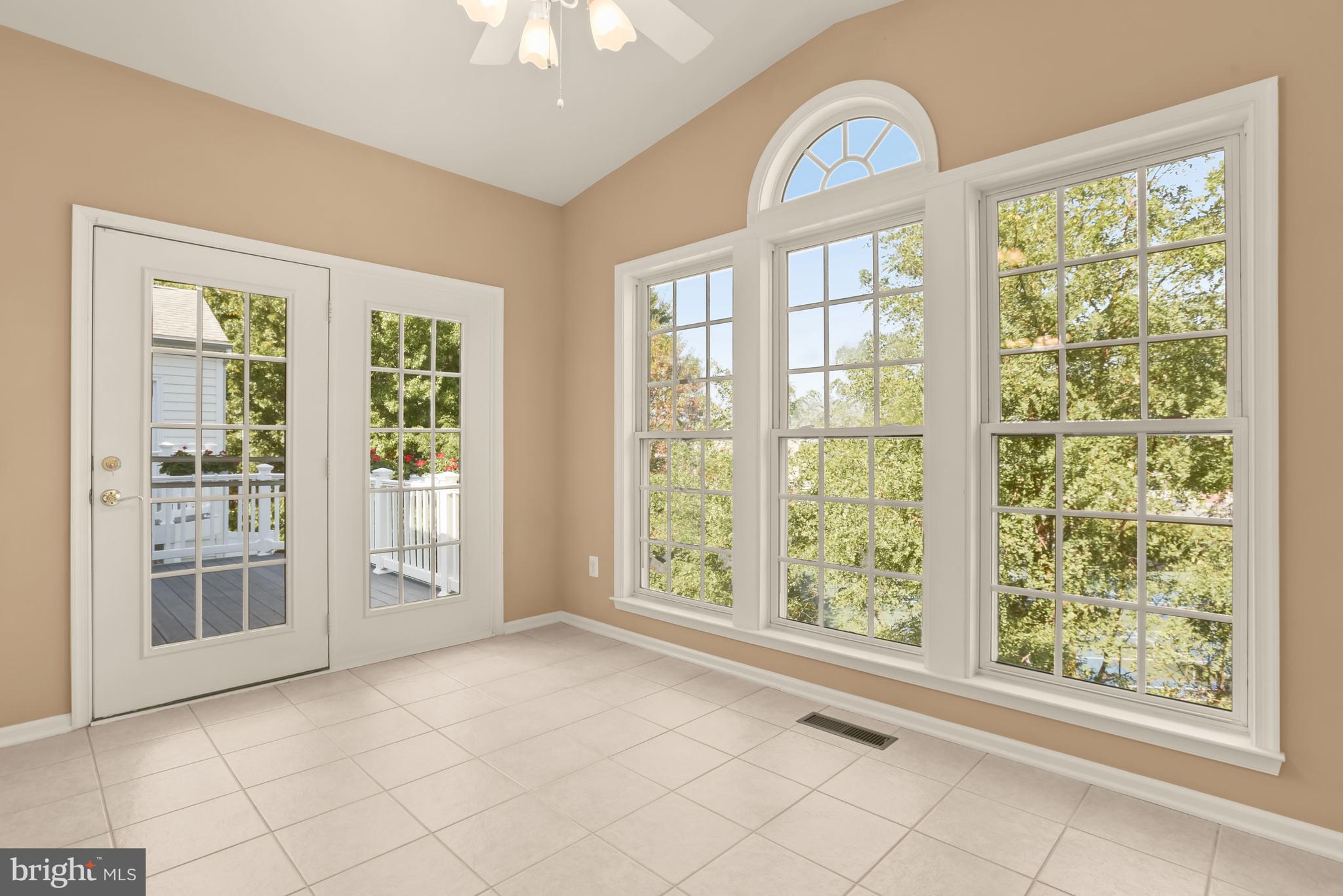 8266 Academy Road, Unit 2 Ellicott City, MD 21043 - Photo 5 of 58 Sunroom with deck access