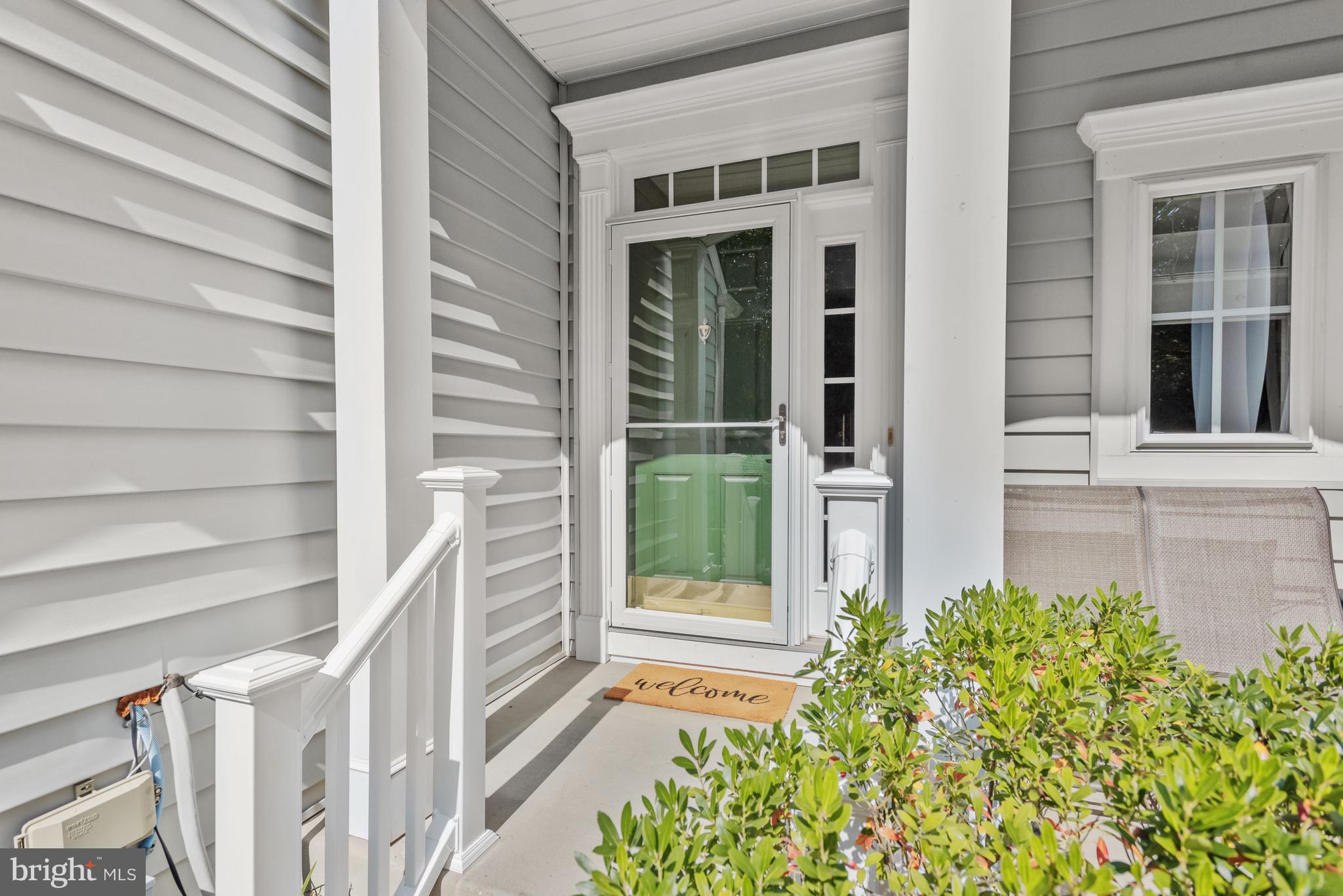8266 Academy Road, Unit 2 Ellicott City, MD 21043 - Photo 7 of 58 Covered entry with new handrail