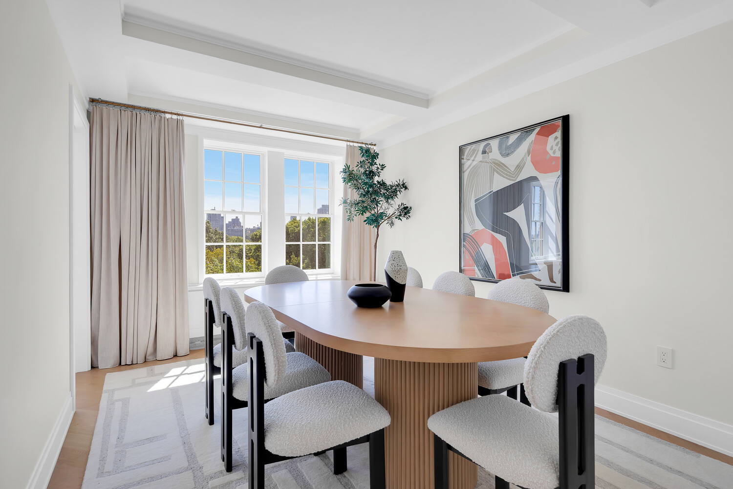 360 Central Park West, Unit 8A/9A Manhattan, NY 10025 - Photo 7 of 17 a view of a dining room with furniture and wooden floor