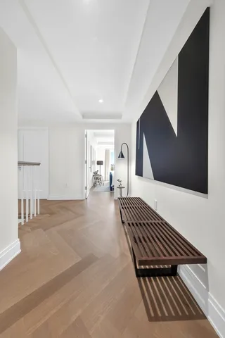 a view of a livingroom with wooden floor