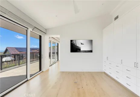 a view of a house with a yard and plants