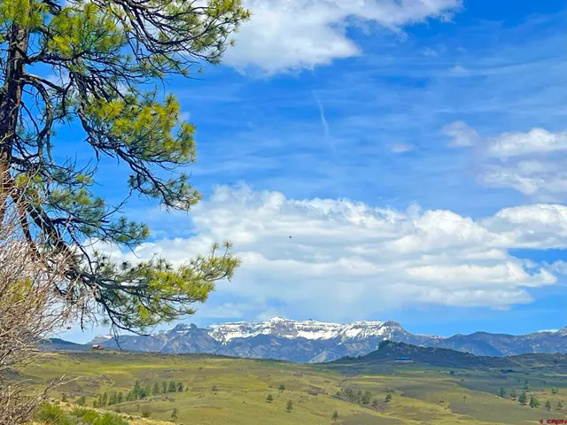 a view of a lake with a mountain in the background
