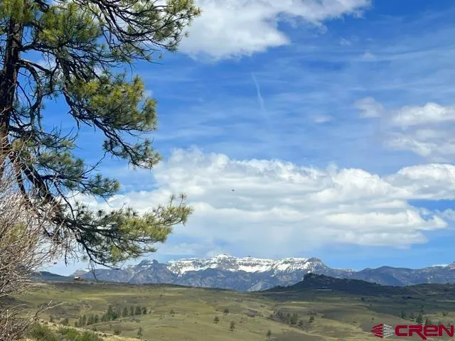 a view of a lake with a mountain