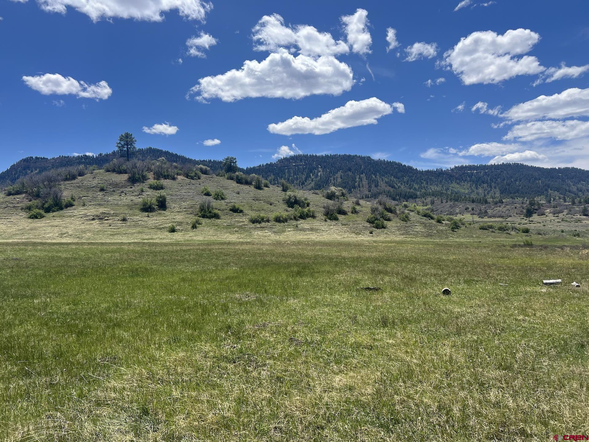 223 Spg Vly Rnch Road Chromo, CO 81128 - Photo 29 of 32 a view of a lake with sunset