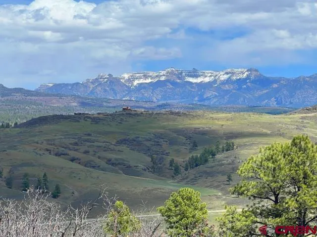 a view of lake with mountain