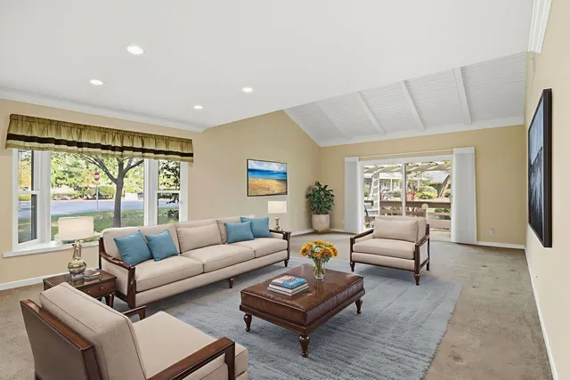 a large kitchen with stainless steel appliances granite countertop a stove a sink and a granite counter tops