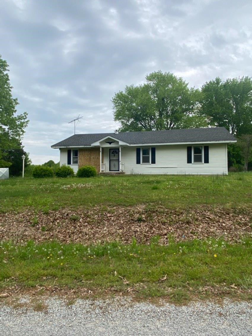 700 Pilgrims Rest Road McKenzie, TN 38201 - Photo 1 of 13 a view of a house with a yard