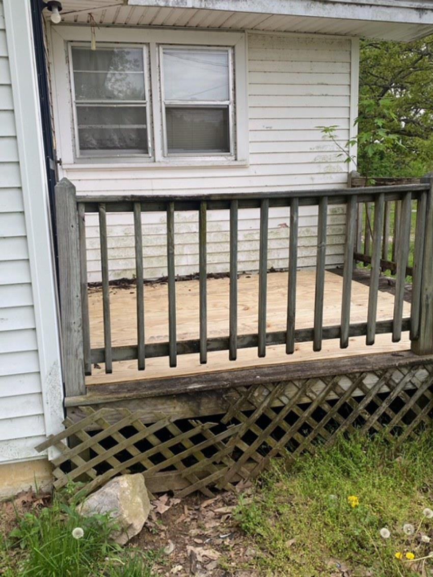 700 Pilgrims Rest Road McKenzie, TN 38201 - Photo 4 of 13 a view of a porch with a bench