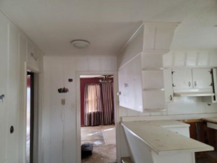 700 Pilgrims Rest Road McKenzie, TN 38201 - Photo 5 of 13 a kitchen with refrigerator and cabinets