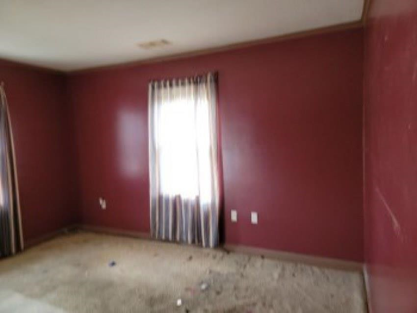 700 Pilgrims Rest Road McKenzie, TN 38201 - Photo 6 of 13 an empty room with windows and closet