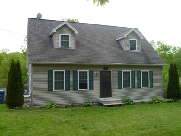 61 O'Neil Road Warren, MA 01092 - Photo 1 of 21 a front view of a house with a yard