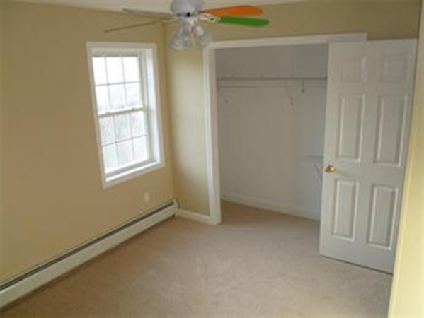 61 O'Neil Road Warren, MA 01092 - Photo 16 of 21 an empty room with windows