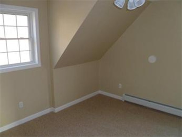 61 O'Neil Road Warren, MA 01092 - Photo 17 of 21 an empty room with a window