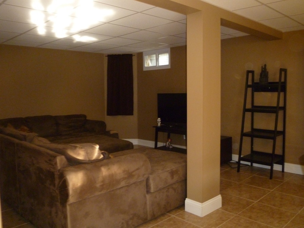 61 O'Neil Road Warren, MA 01092 - Photo 19 of 21 a bedroom with a bed and a chair