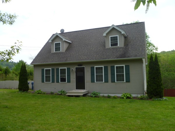 61 O'Neil Road Warren, MA 01092 - Photo 2 of 21 a view of an house with backyard space and garden