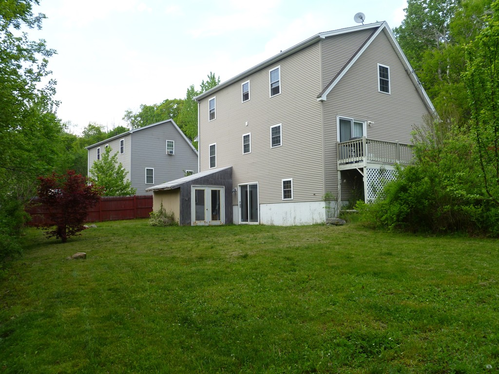 61 O'Neil Road Warren, MA 01092 - Photo 4 of 21 a house view with a garden space