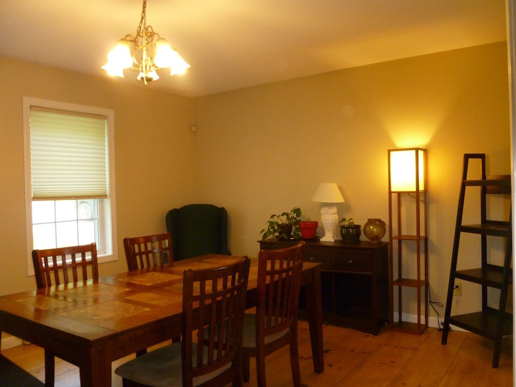 61 O'Neil Road Warren, MA 01092 - Photo 8 of 21 a view of a dining room with furniture and chandelier