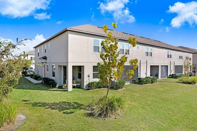 a view of a house with garden