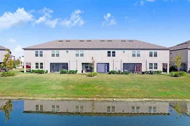 a view of a big yard with a large pool