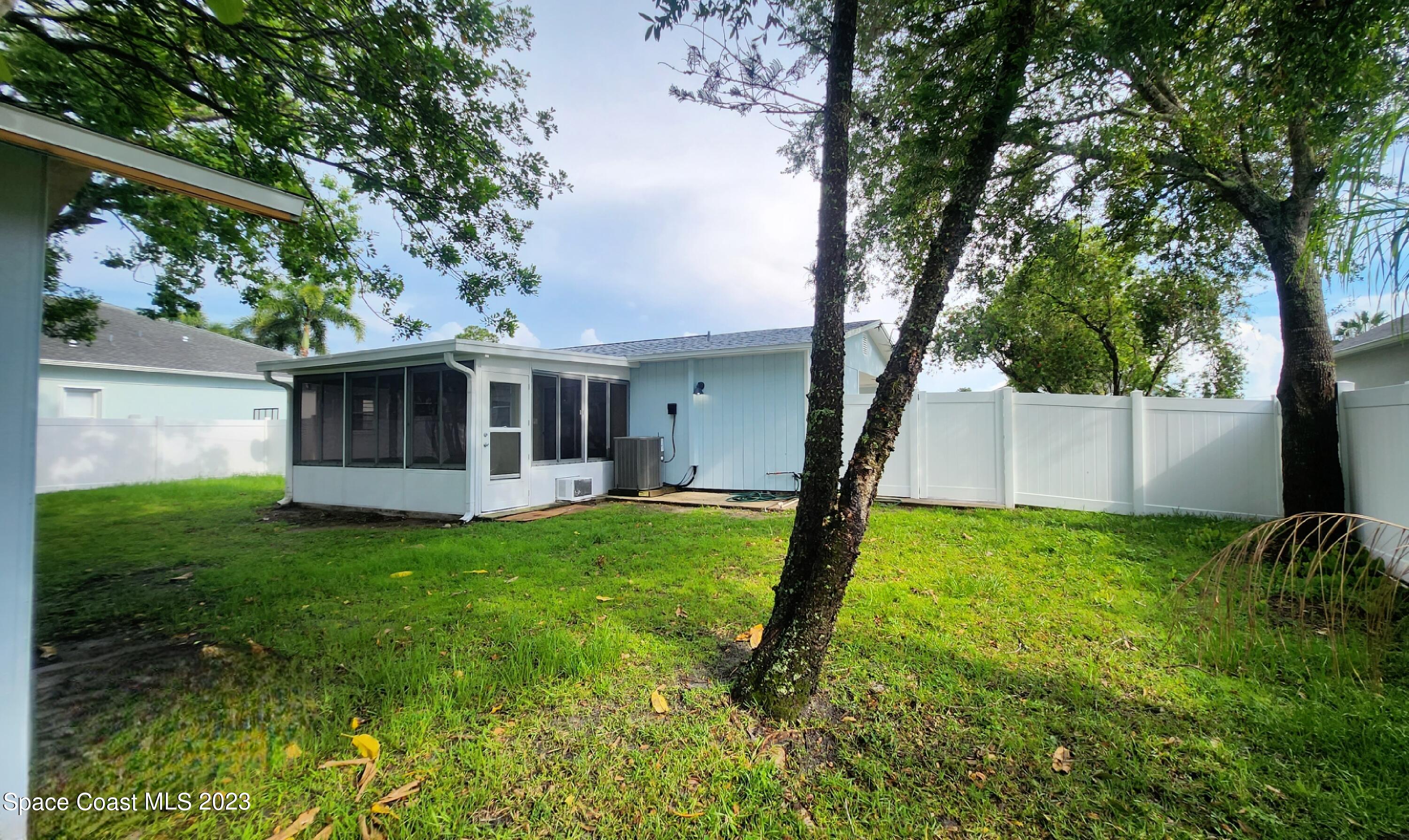 925 Gulfstream Avenue Sebastian, FL 32958 - Photo 16 of 19 a view of a house with a backyard