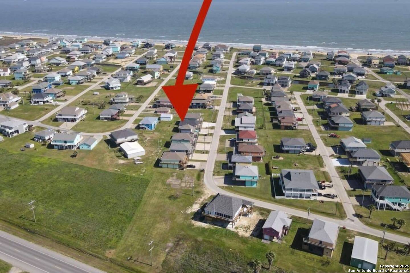972 Surf Road Crystal Beach, TX 77650 - Photo 17 of 18 an aerial view of multiple house