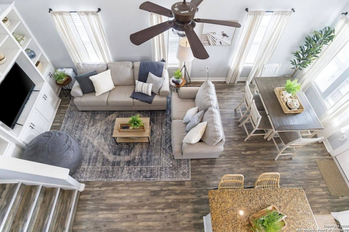 972 Surf Road Crystal Beach, TX 77650 - Photo 4 of 18 a living room with fireplace furniture and a flat screen tv