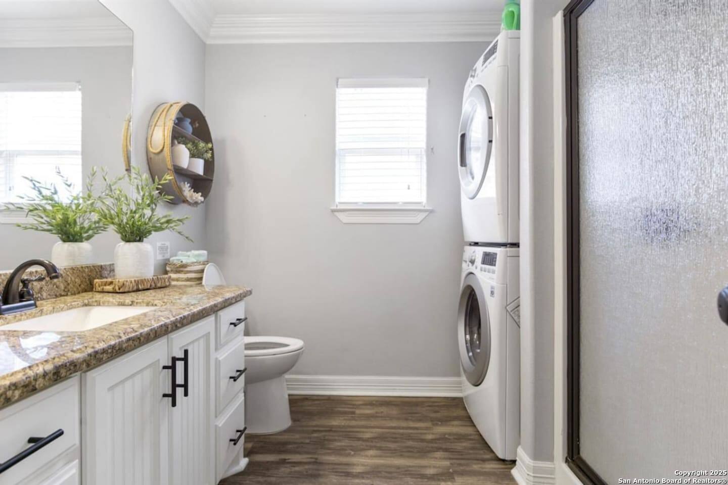 972 Surf Road Crystal Beach, TX 77650 - Photo 5 of 18 a view of bathroom with a sink and toilet