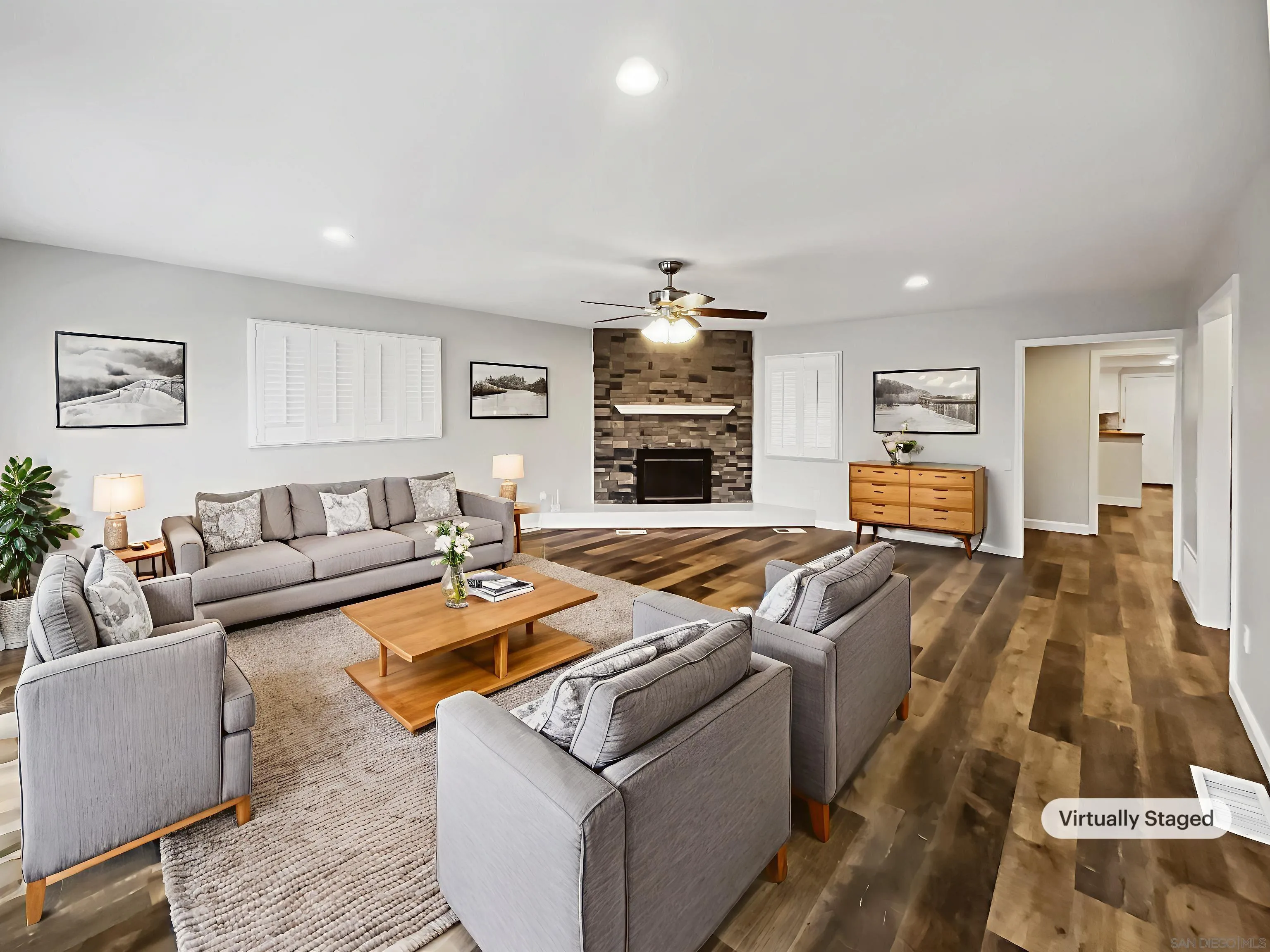 212 South Wisconsin Street Fallbrook, CA 92028 - Photo 2 of 16 a living room with furniture and a flat screen tv