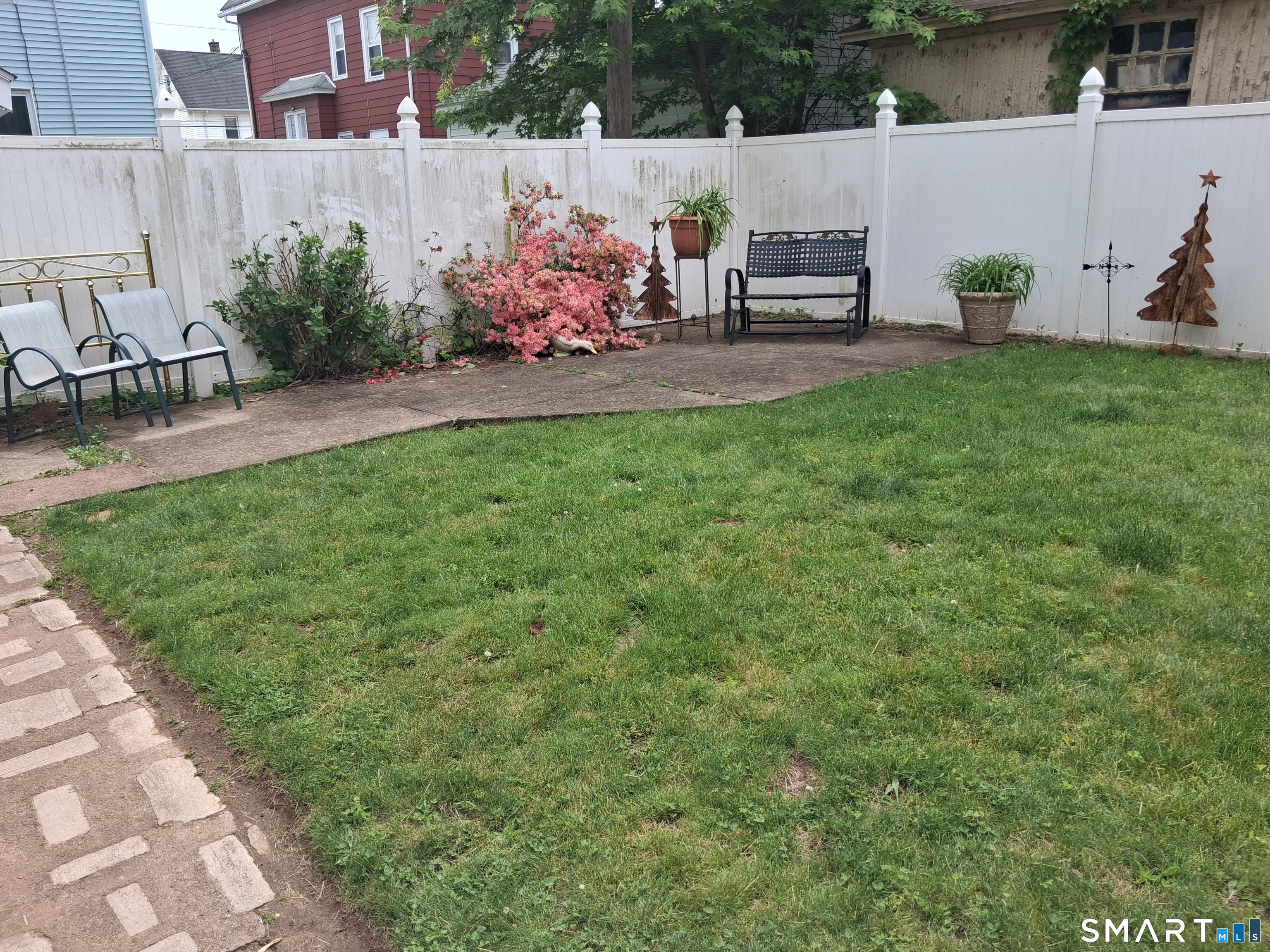 26 4th Street Hamden, CT 06514 - Photo 17 of 40 a view of a backyard with sitting area