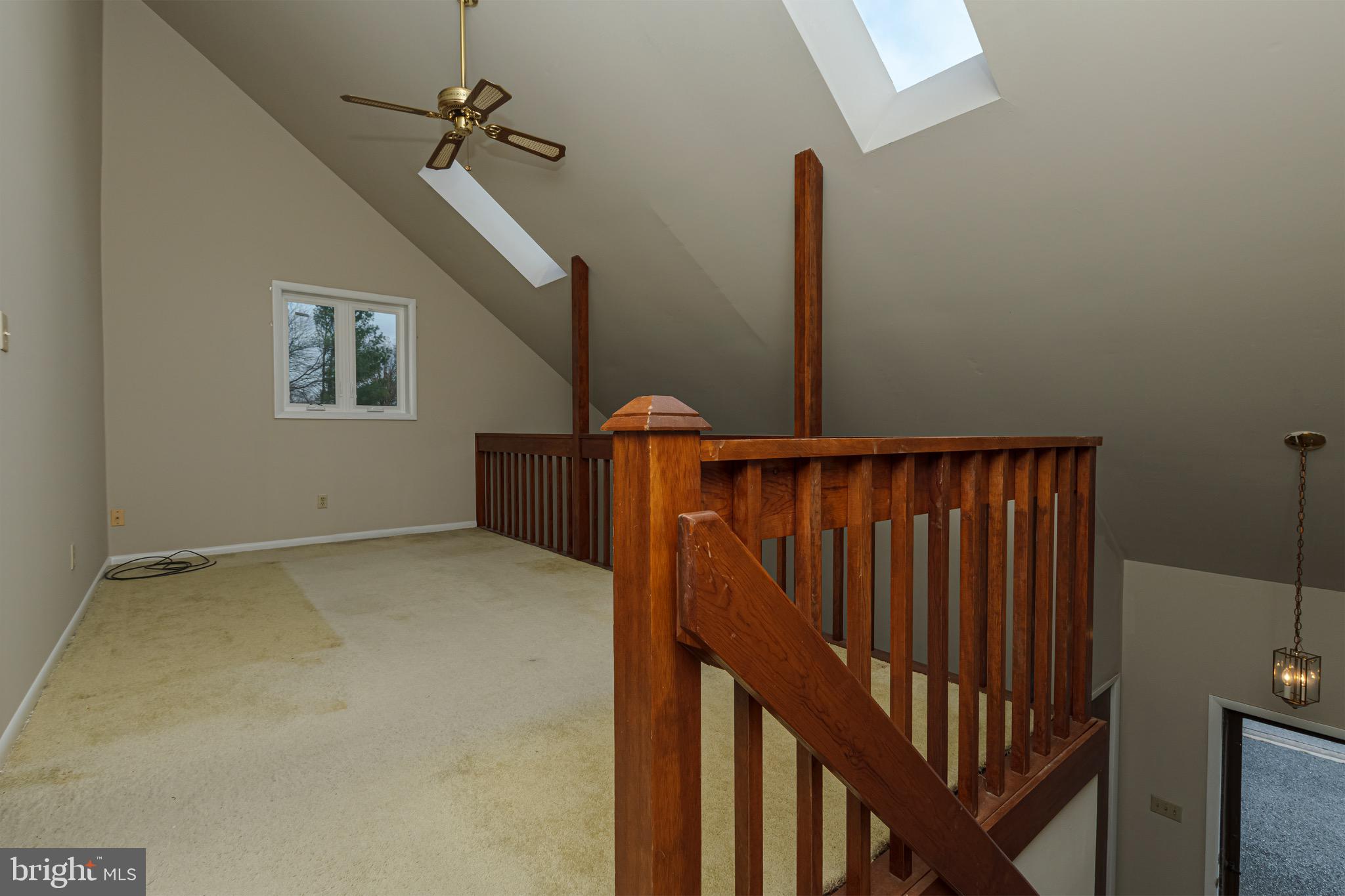 59 Valley Circle Newark, DE 19711 - Photo 13 of 23 a view of staircase with railing and white walls