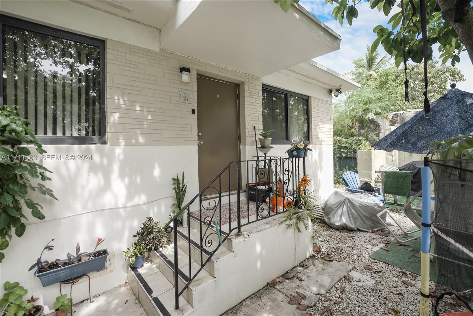 175 Northwest 68th Street Miami, FL 33150 - Photo 20 of 31 a view of balcony and patio