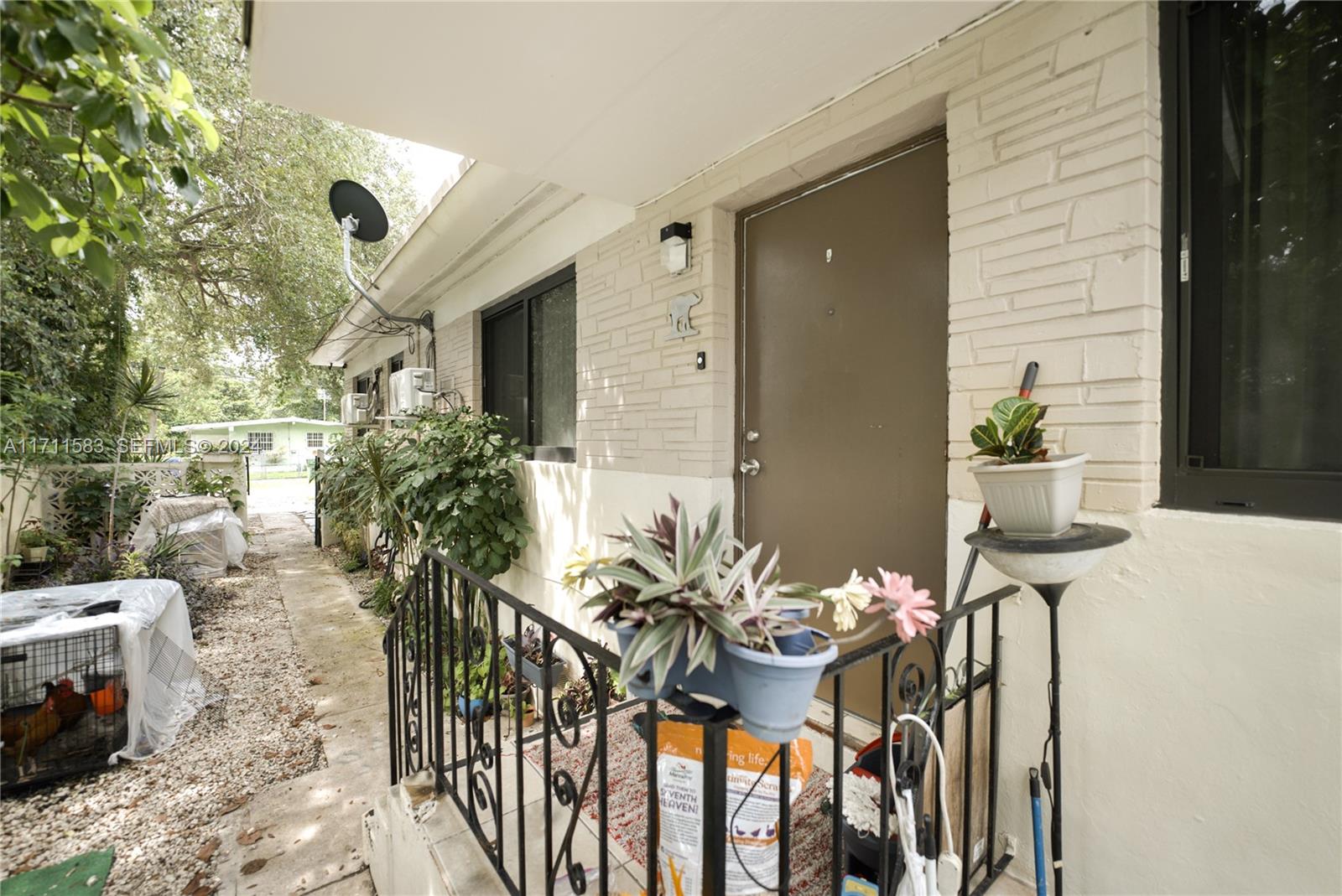 175 Northwest 68th Street Miami, FL 33150 - Photo 23 of 31 a view of balcony and patio