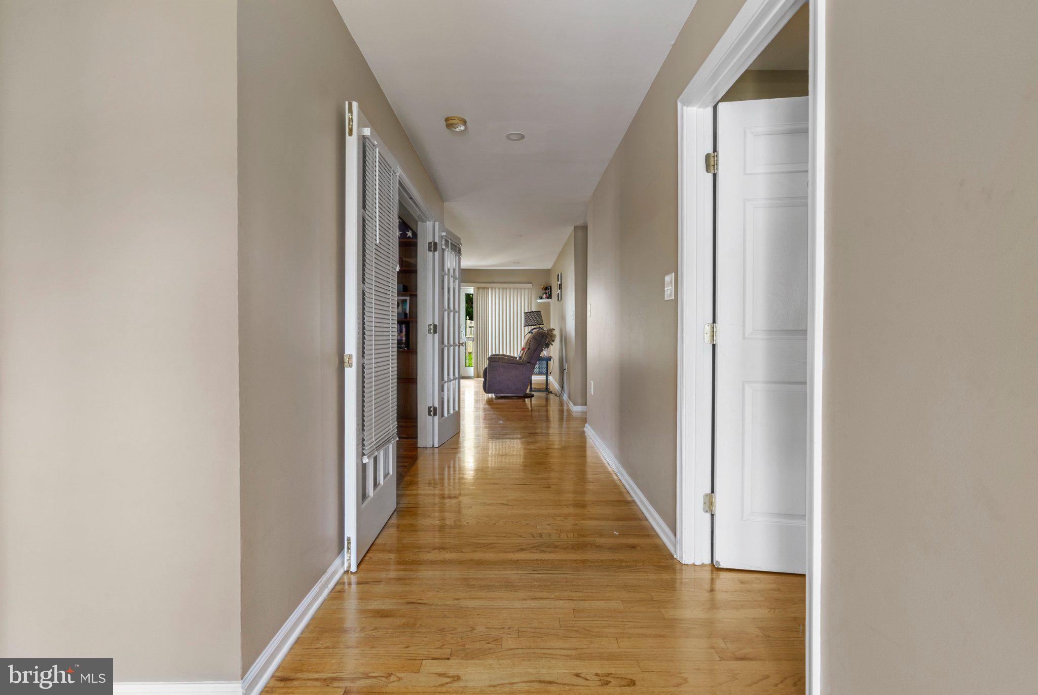 120 Peter Rabbit Drive Ranson, WV 25438 - Photo 3 of 31 Inviting hallway with warm wood floors.